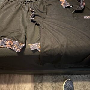 Black Polo Shirt and Shorts Set with Geometric Accents